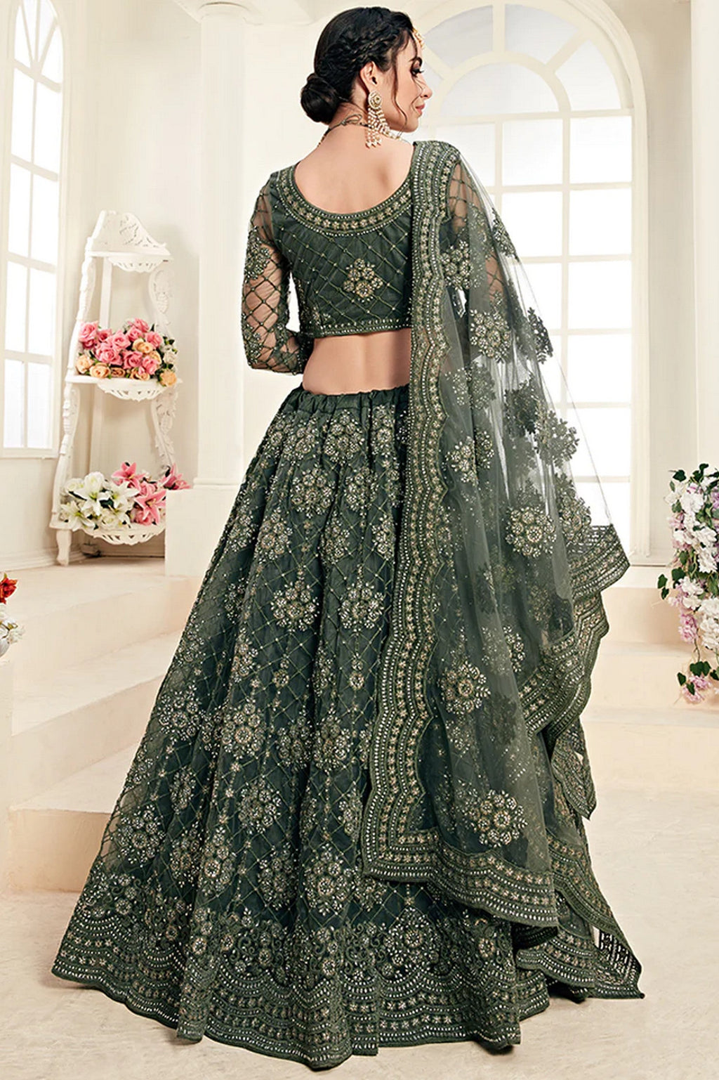 Mahendi net lehenga choli back view showing thread and badla embroidery