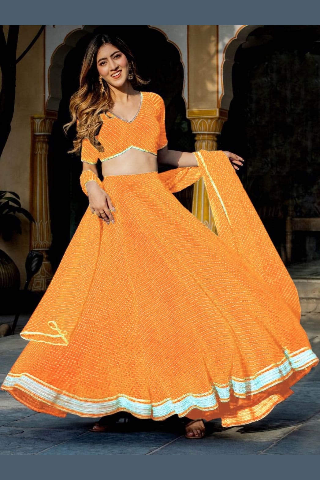 Orange Georgette Leriya Print Lehenga Choli For Indian & Pakistani Wedding Festival - Print Work, Zari Work