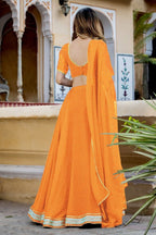 Orange Georgette Leriya Print Lehenga Choli For Indian & Pakistani Wedding Festival - Print Work, Zari Work
