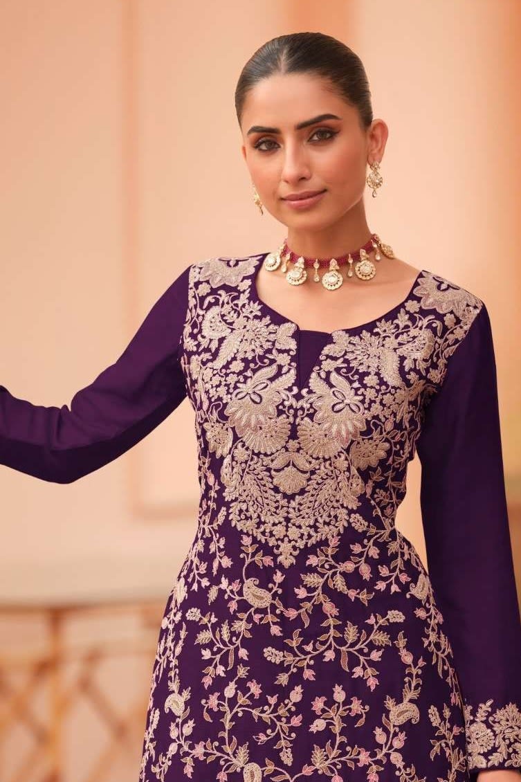 Torso detail view of a dark purple palazzo suit in chinon silk with thread embroidery work on the kameez bodice and dupatta.