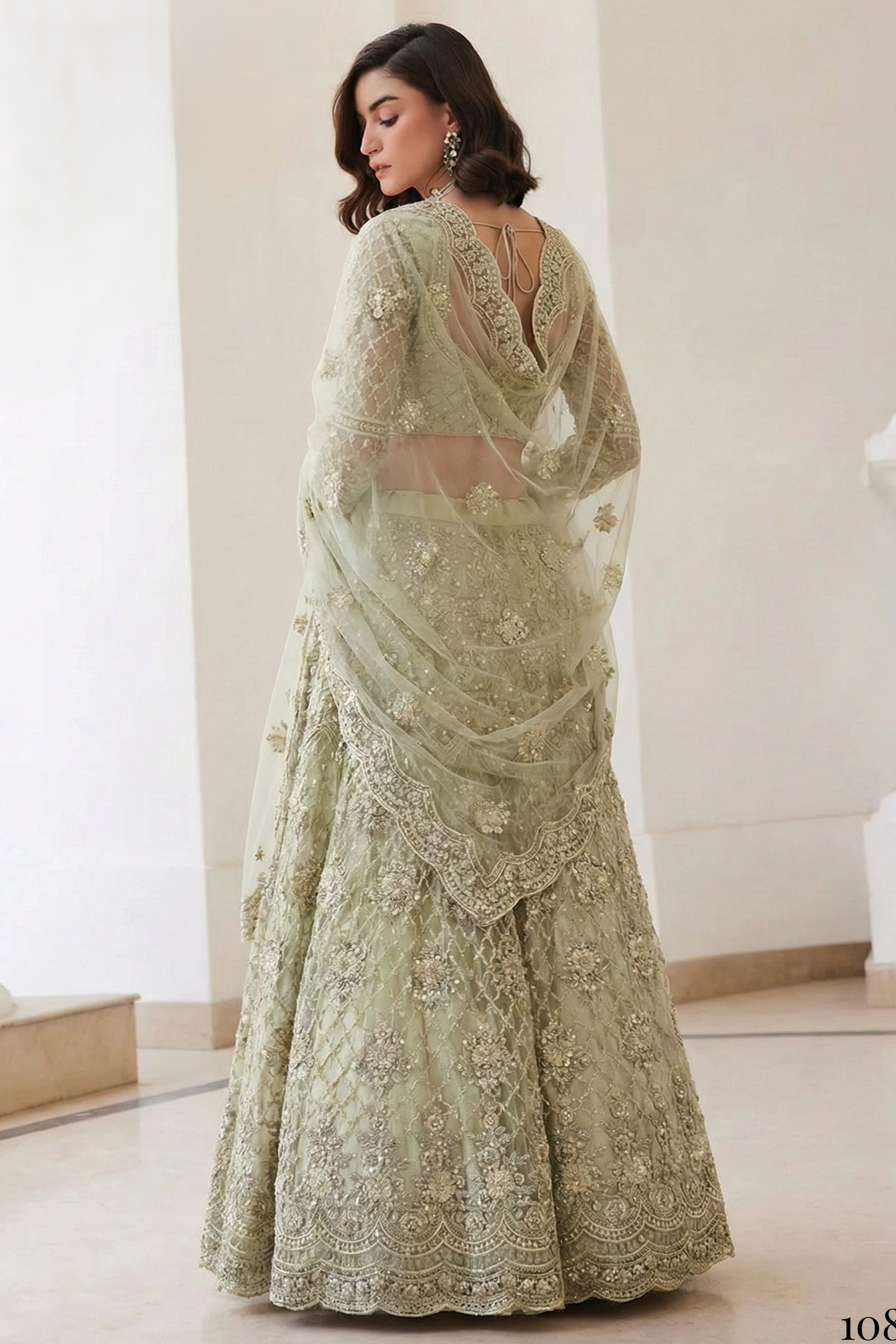 Pista Green Net Sangeet Lehenga Choli with Thread and Sequin Work