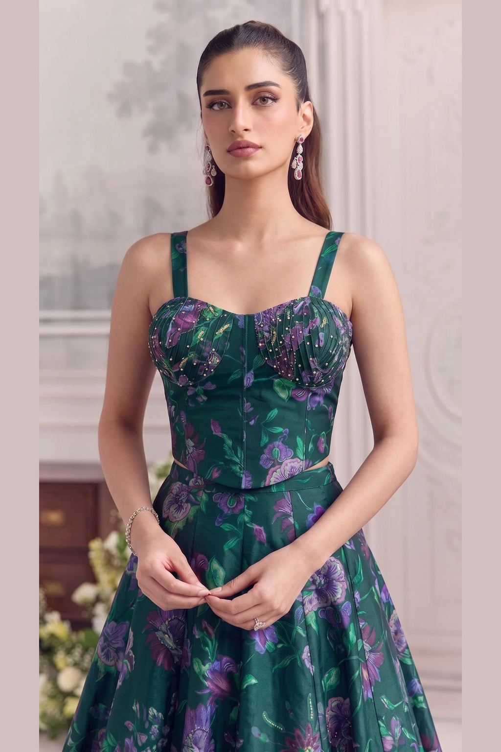 Close-up of the bottle green blouse's pleated sweetheart neckline with flower work.