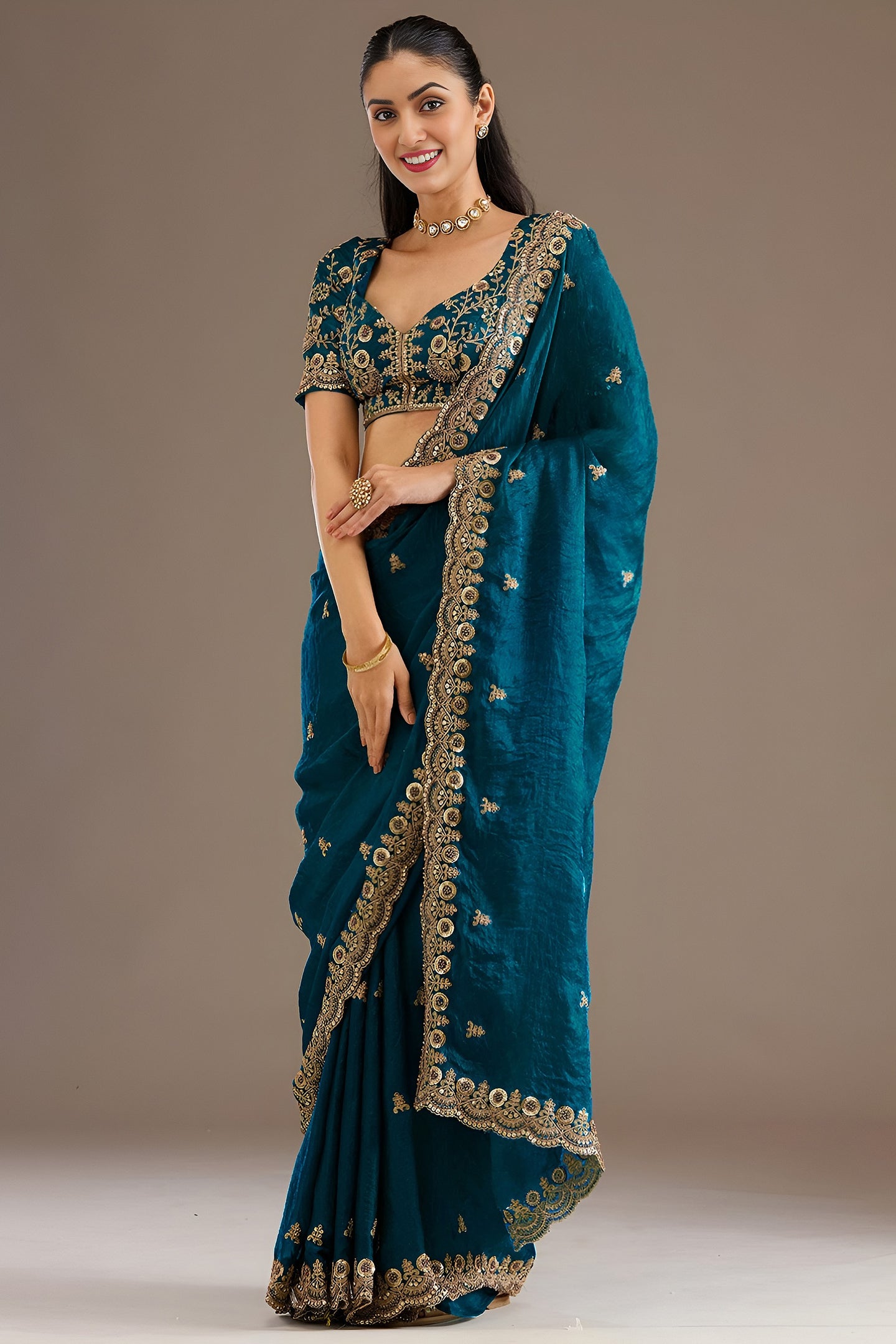 Teal Tissue Saree with Stitched Blouse featuring Sequin Zari and Pearl Work