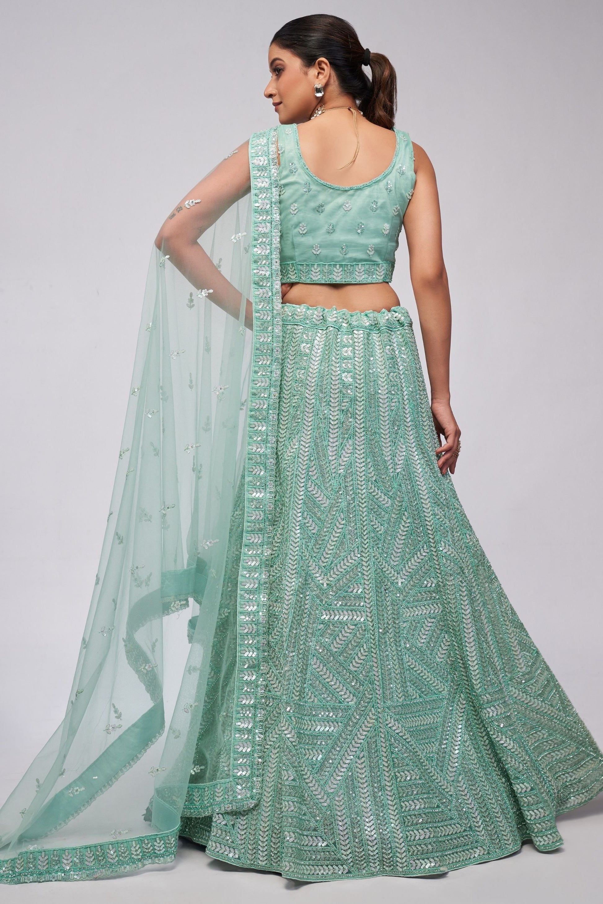 Turquoise Soft Net Lehenga Choli For Indian Festivals & Weddings - Sequins Work, Dori Work, Zarkan Work