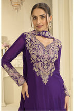 Close-up of a purple palazzo suit bodice in chinon silk with delicate thread and sequin embroidery on the neckline and sleeves.