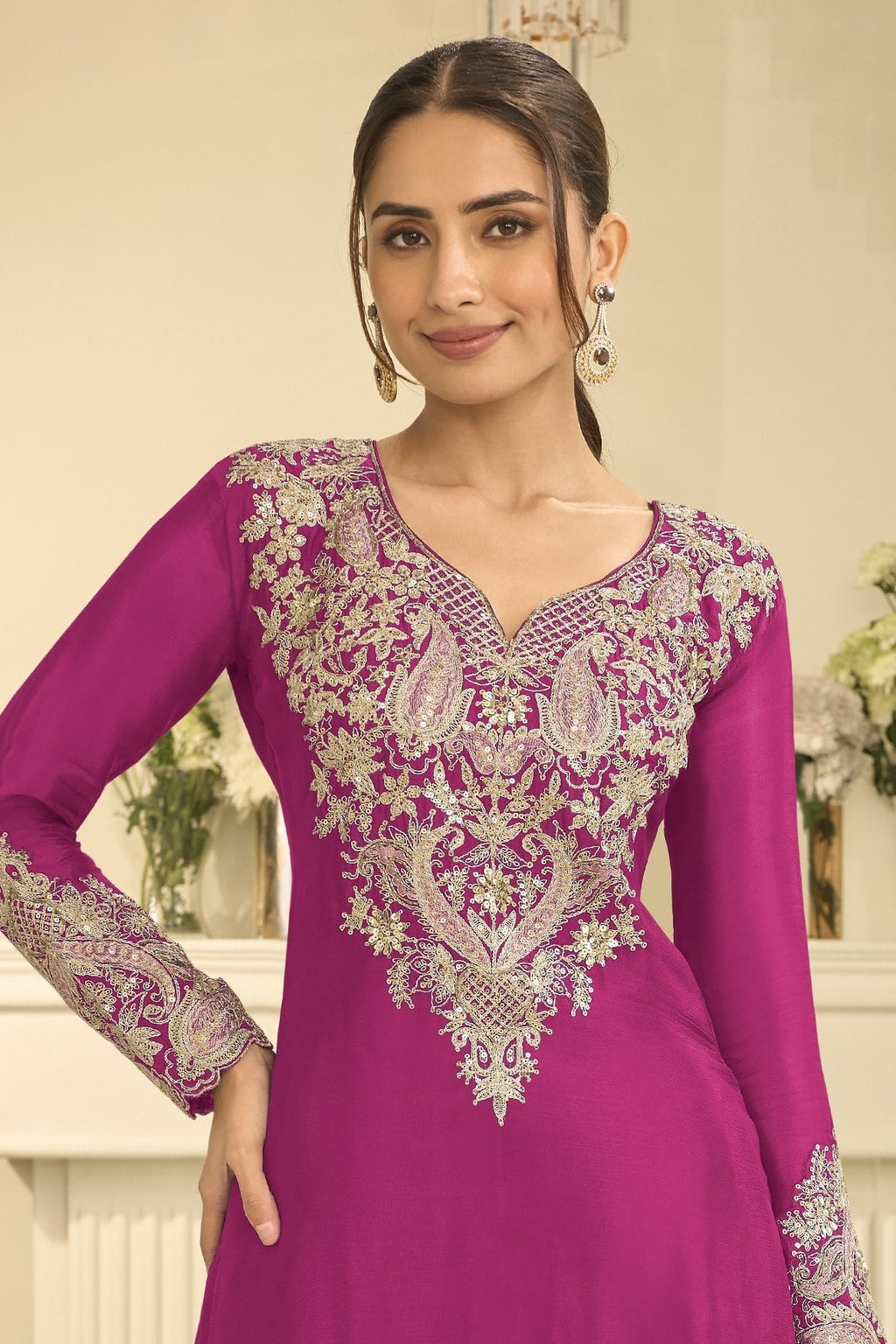 Torso detail view of magenta engagement dresses for women style plazo suit in chinon silk with thread and sequin embroidery on the kameez.