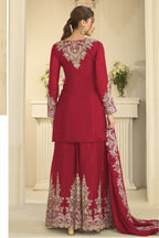 Full-length back view of red mehndi outfits style plazo suit in chinon silk with thread and sequin embroidery on the back and dupatta.