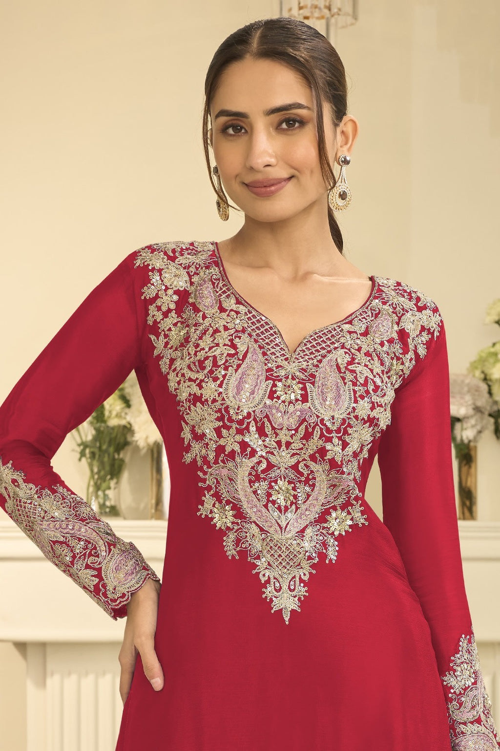 Torso detail view of red outfits for eid style plazo suit in chinon silk with thread and sequin embroidery on the kameez.