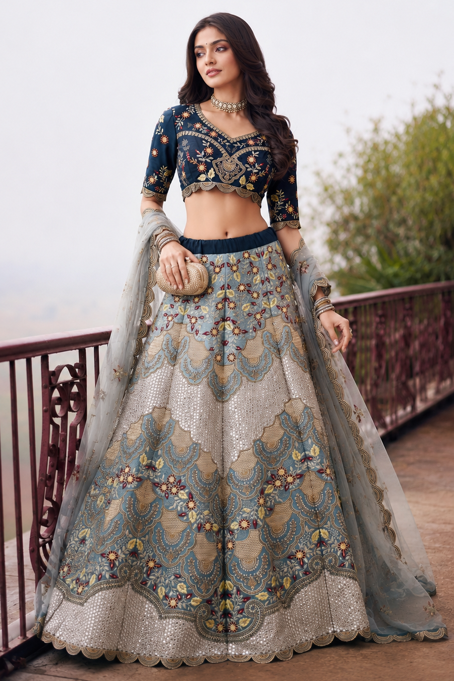 Woman wearing a navy blue silk lehenga for wedding with embroidery work, half sleeve sweetheart neck silk choli, full-length front view.