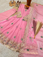 Light pink indian kidswear girls anarkali set flat lay showing the full three-piece set with embroidered dupatta.