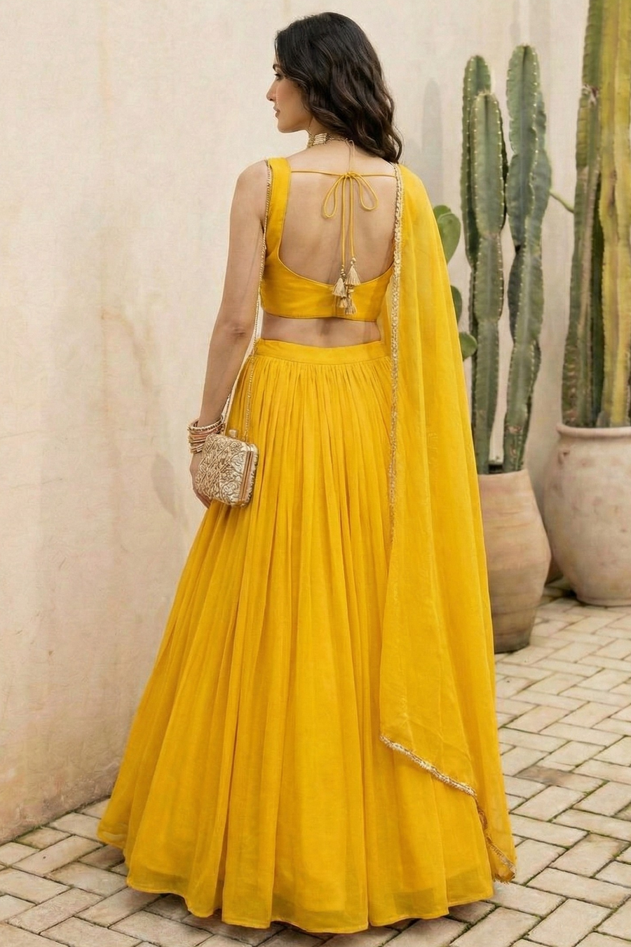 Yellow Georgette Sleeveless Mirror Work Lehenga Choli with Embroidery