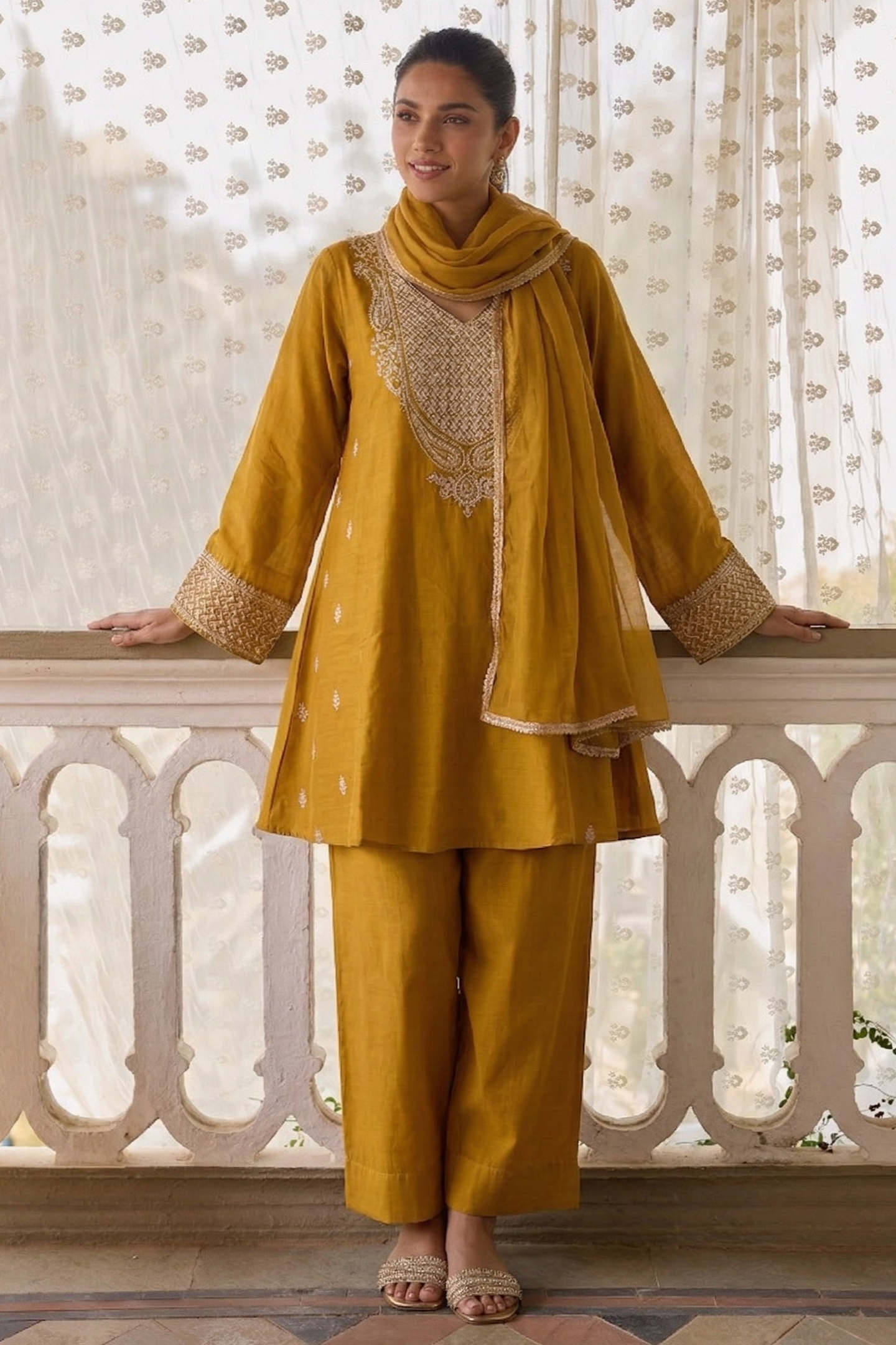 Yellow Cotton Silk Loose Fit A Line Kurta Set for Women with Embroidery Work