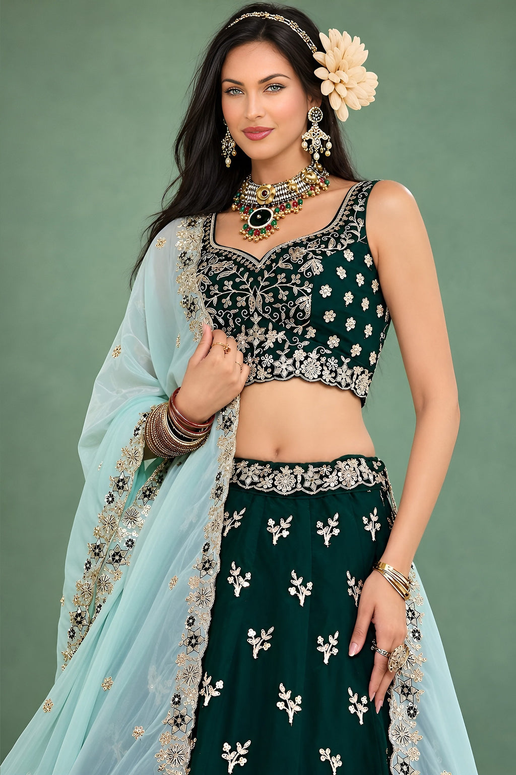 Half front view of a dark green lehenga for mehndi, highlighting the sleeveless sweetheart blouse and the worked dupatta.