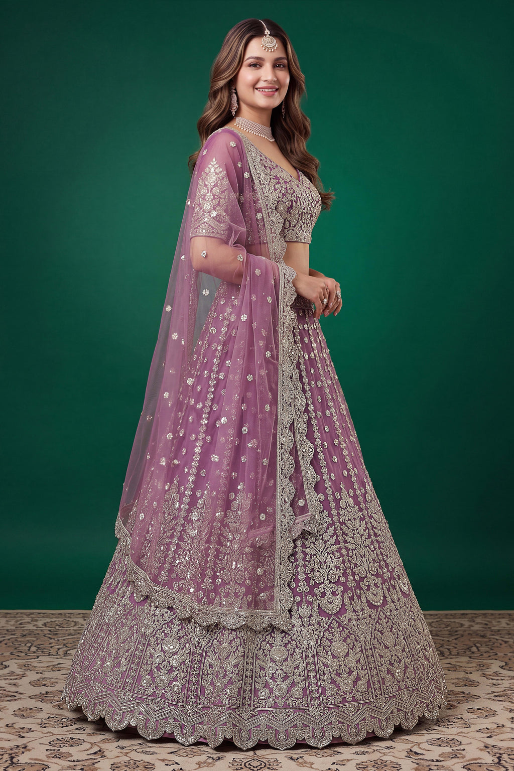 Alternate view of a light purple reception lehenga in net with zari, dori and sequins work on the sleeveless blouse and lehenga.