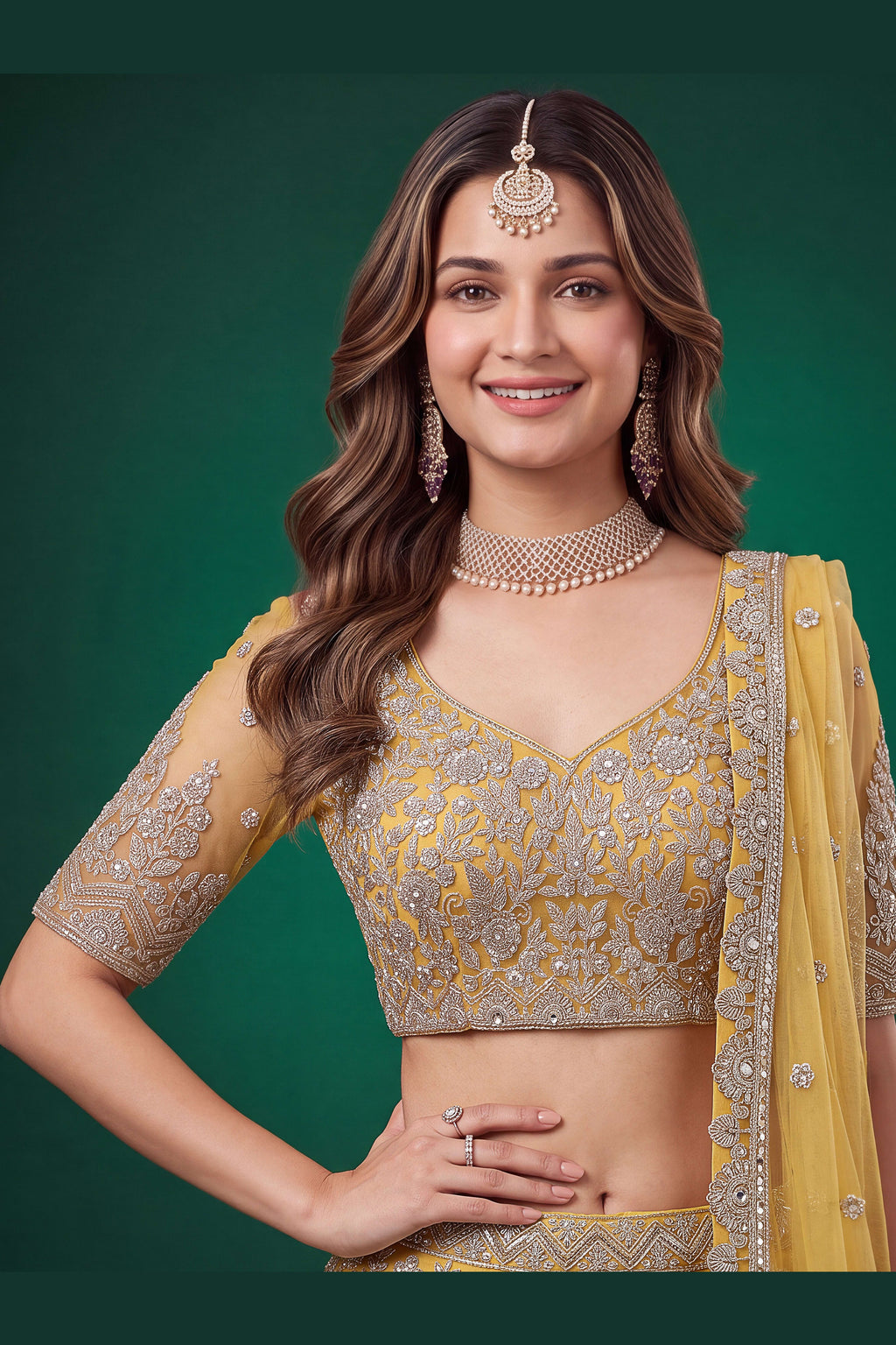 Full-length back view of a mustard yellow haldi outfits lehenga in net with an open back blouse with dori tie and zari and sequins work.