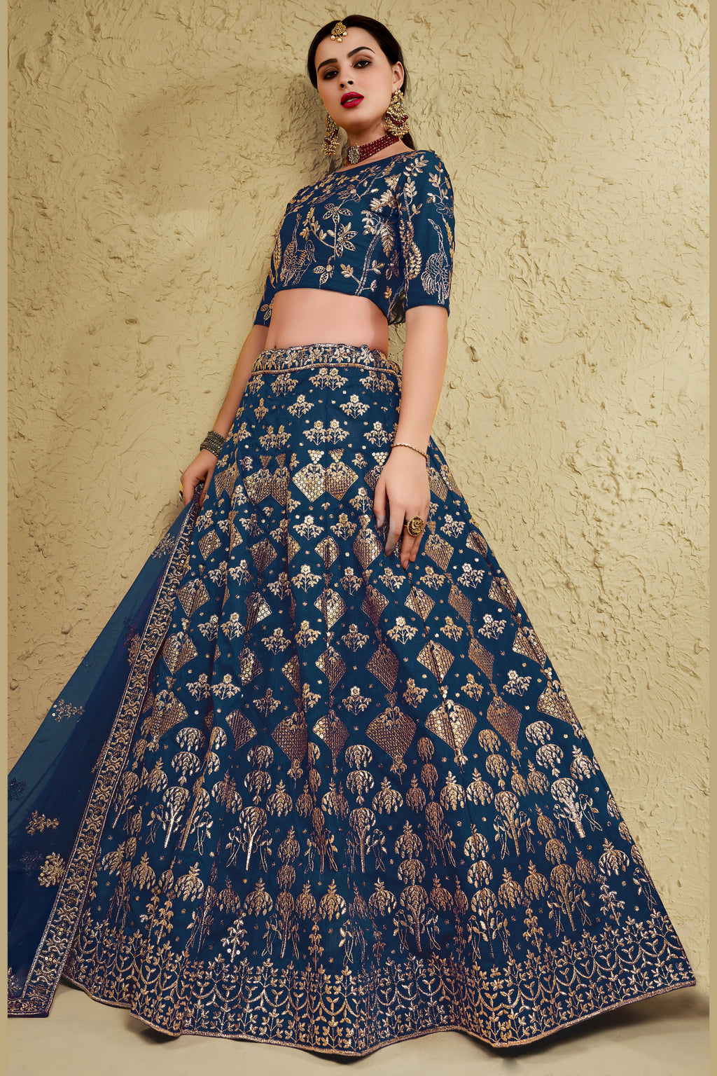Alternate full-length view of a blue engagement dresses for women lehenga in art silk with zari and sequin embroidery work.