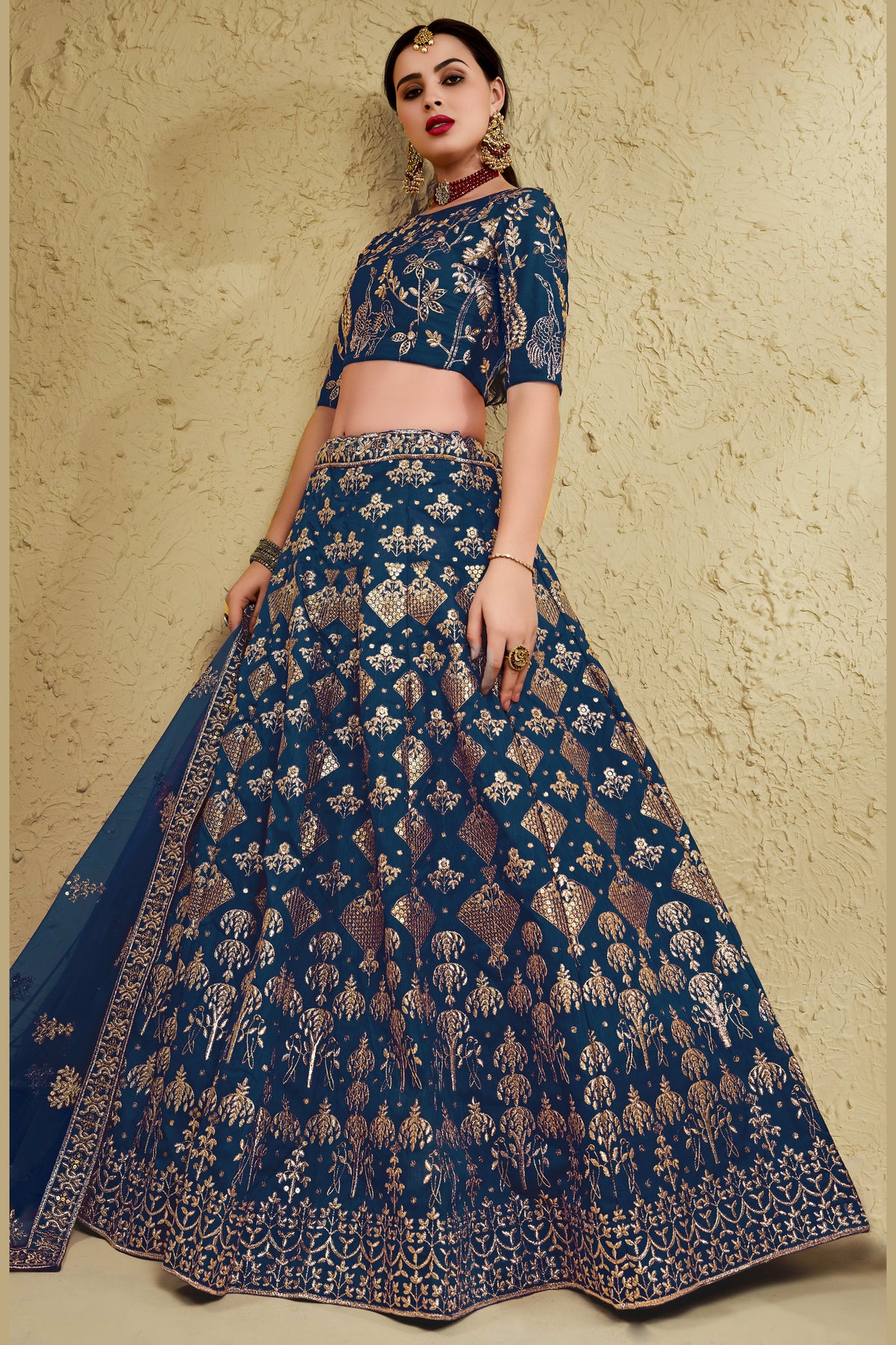 Alternate full-length view of a blue engagement dresses for women lehenga in art silk with zari and sequin embroidery work.
