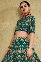 Alternate full-length view of a green sangeet lehenga in art silk with zari and sequin embroidery work on the blouse and lehenga.