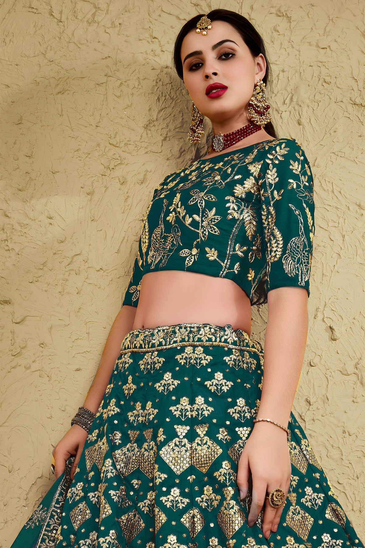Alternate full-length view of a green sangeet lehenga in art silk with zari and sequin embroidery work on the blouse and lehenga.