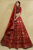 Additional view of a red reception lehenga in art silk with zari and sequin embroidery work on the half sleeve blouse and lehenga.