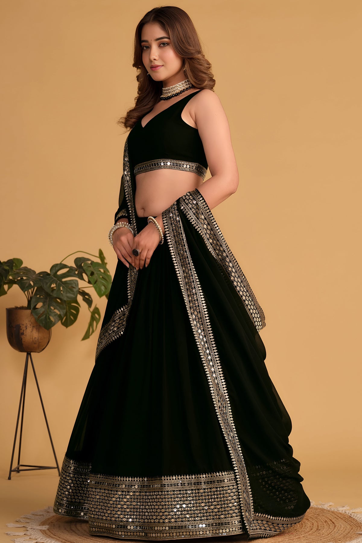 Additional view of a black engagement dresses for women lehenga with zari and sequin embroidery throughout throughout the outfit.