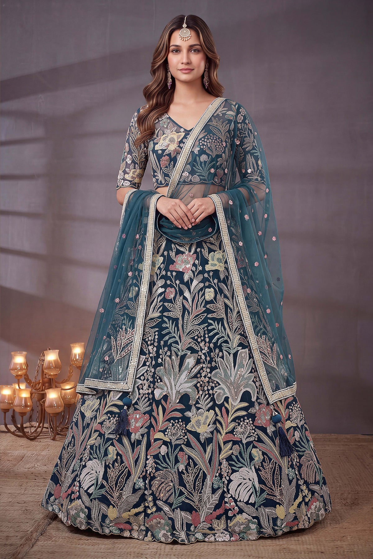 Teal lehenga for wedding, shown in a full front view, featuring thread and sequins embroidery work on net fabric.