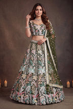 Olive Green embroidered lehenga, close-up of the blouse and choli embroidery detailing, featuring thread and sequins embroidery work on net fabric.
