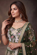 Olive Green embroidered lehenga, detail view of the thread and sequins embroidery on net fabric, featuring thread and sequins embroidery work on net fabric.