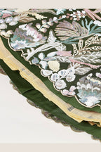 Olive Green sangeet lehenga, close-up of the lehenga border and hem work, featuring thread and sequins embroidery work on net fabric.