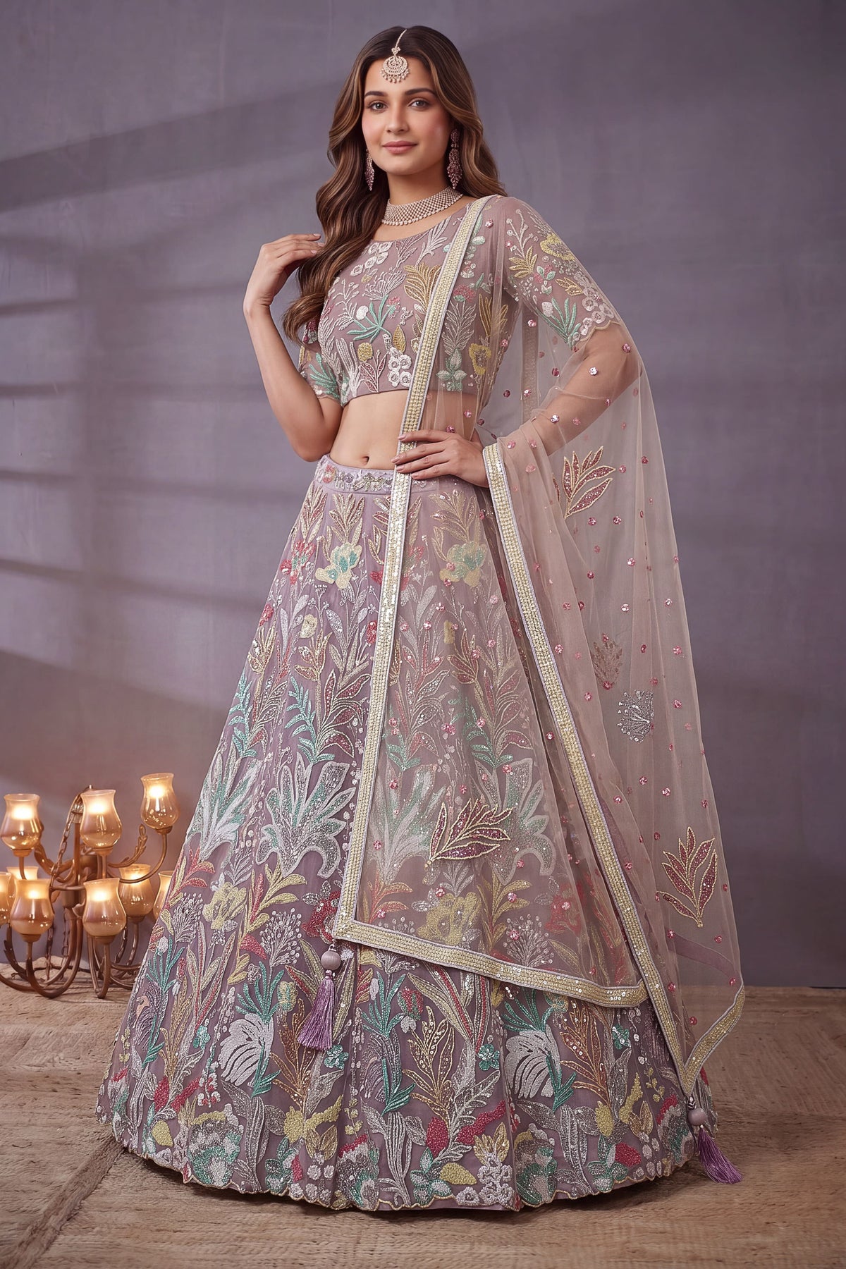 Dusty Rose engagement lehenga, close-up of the blouse and choli embroidery detailing, featuring thread and sequins embroidery work on net fabric.