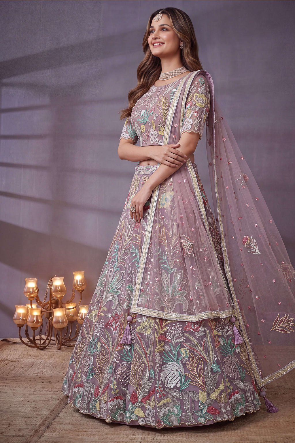 Dusty Rose bridesmaid lehenga, close-up of the lehenga skirt embroidery and sequin work, featuring thread and sequins embroidery work on net fabric.