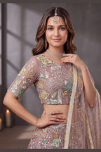 Dusty Rose engagement lehenga, detail view of the thread and sequins embroidery on net fabric, featuring thread and sequins embroidery work on net fabric.
