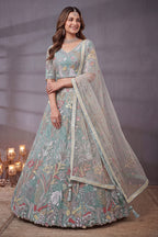 Sky Blue sequin lehenga, close-up of the lehenga skirt embroidery and sequin work, featuring thread and sequins embroidery work on net fabric.