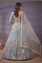 Sky Blue sequin lehenga, shown from the back view displaying the backside embroidery work, featuring thread and sequins embroidery work on net fabric.