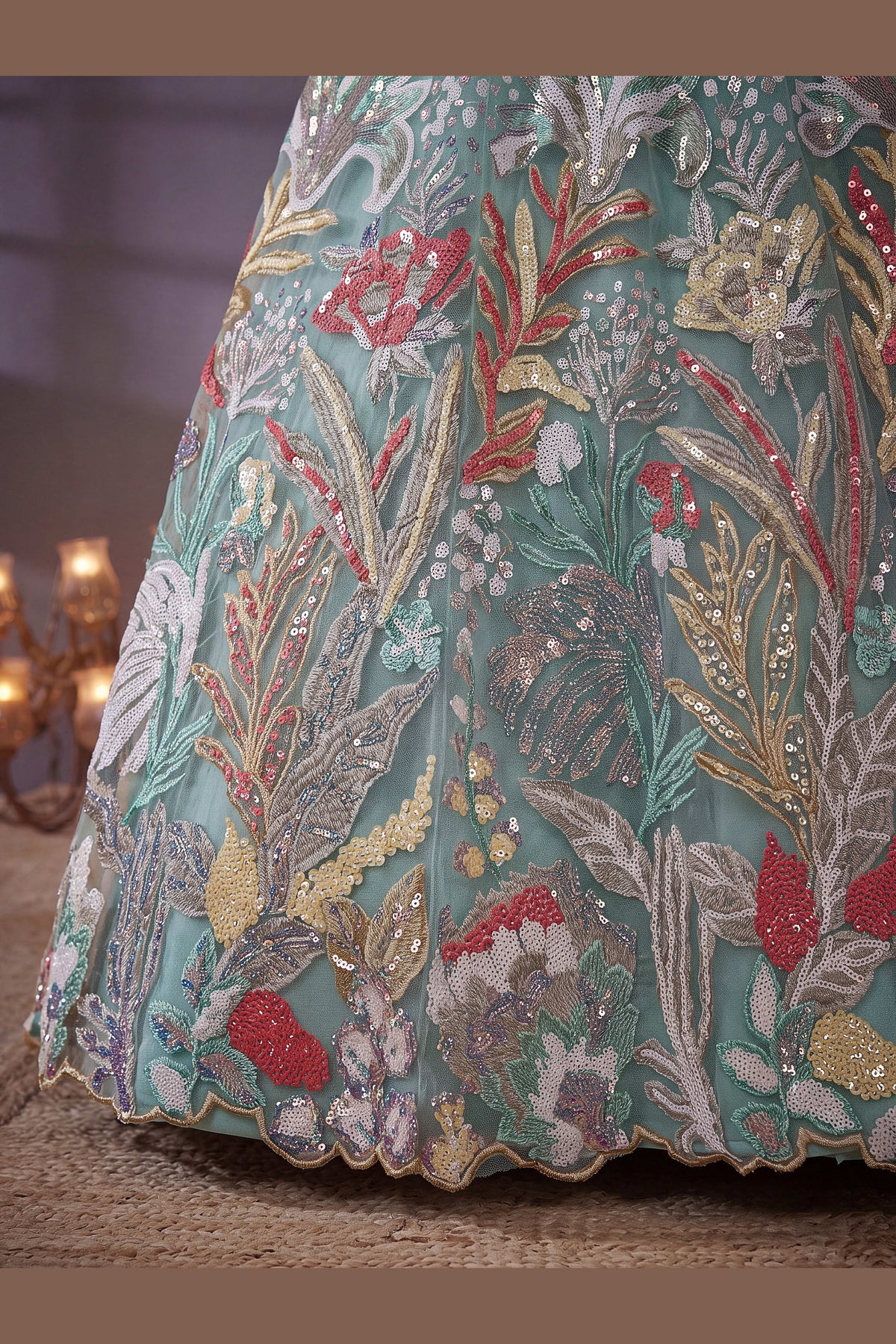 Sky Blue lehenga for diwali, side view showing the lehenga flare and fall, featuring thread and sequins embroidery work on net fabric.