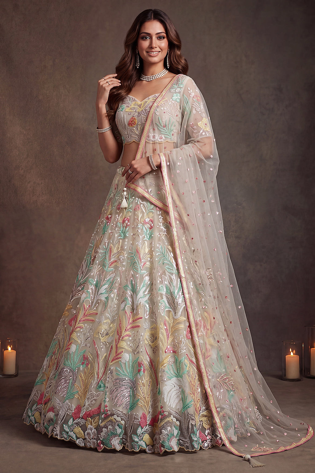 Beige Cream bridesmaid lehenga, shown in a full front view, featuring thread and sequins embroidery work on net fabric.