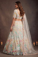 Beige Cream lehenga for diwali, shown from the back view displaying the backside embroidery work, featuring thread and sequins embroidery work on net fabric.