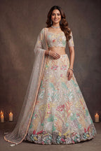 Beige Cream lehenga for diwali, close-up of the lehenga skirt embroidery and sequin work, featuring thread and sequins embroidery work on net fabric.