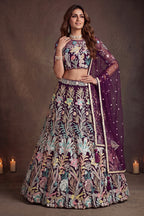 Wine Purple embroidered lehenga, shown from the back view displaying the backside embroidery work, featuring thread and sequins embroidery work on net fabric.