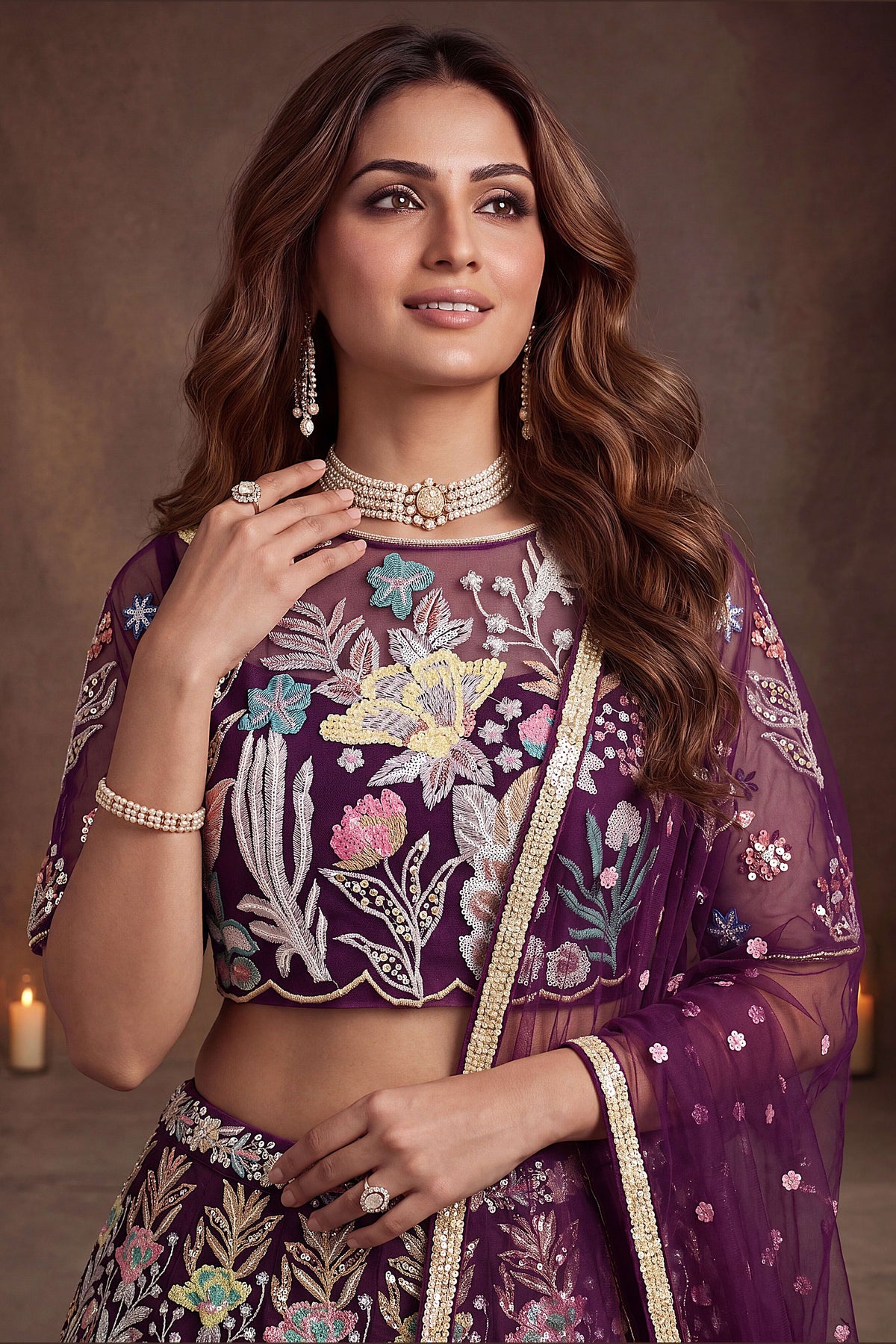 Wine Purple embroidered lehenga, close-up of the lehenga skirt embroidery and sequin work, featuring thread and sequins embroidery work on net fabric.