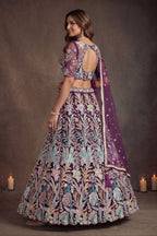 Wine Purple indian wedding lehenga, detail view of the thread and sequins embroidery on net fabric, featuring thread and sequins embroidery work on net fabric.