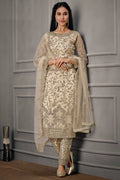 Cream net embroidered kameez with satin pant and net dupatta front view – Indian wedding suit by Hatke Bride