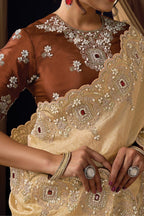 Beige Sequins Saree for Wedding Guest - Pearl & Crystal Stone Handwork - hem and footwear detail
