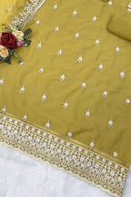 Yellow Organza Silk Kameez With Pant For Indian & Pakistani Wedding Festival - Embroidery Work - hem and footwear detail