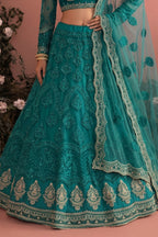 Teal Long Sleeves Lehenga Choli for Wedding Guest in Net with Thread and Sequins - hem and footwear detail