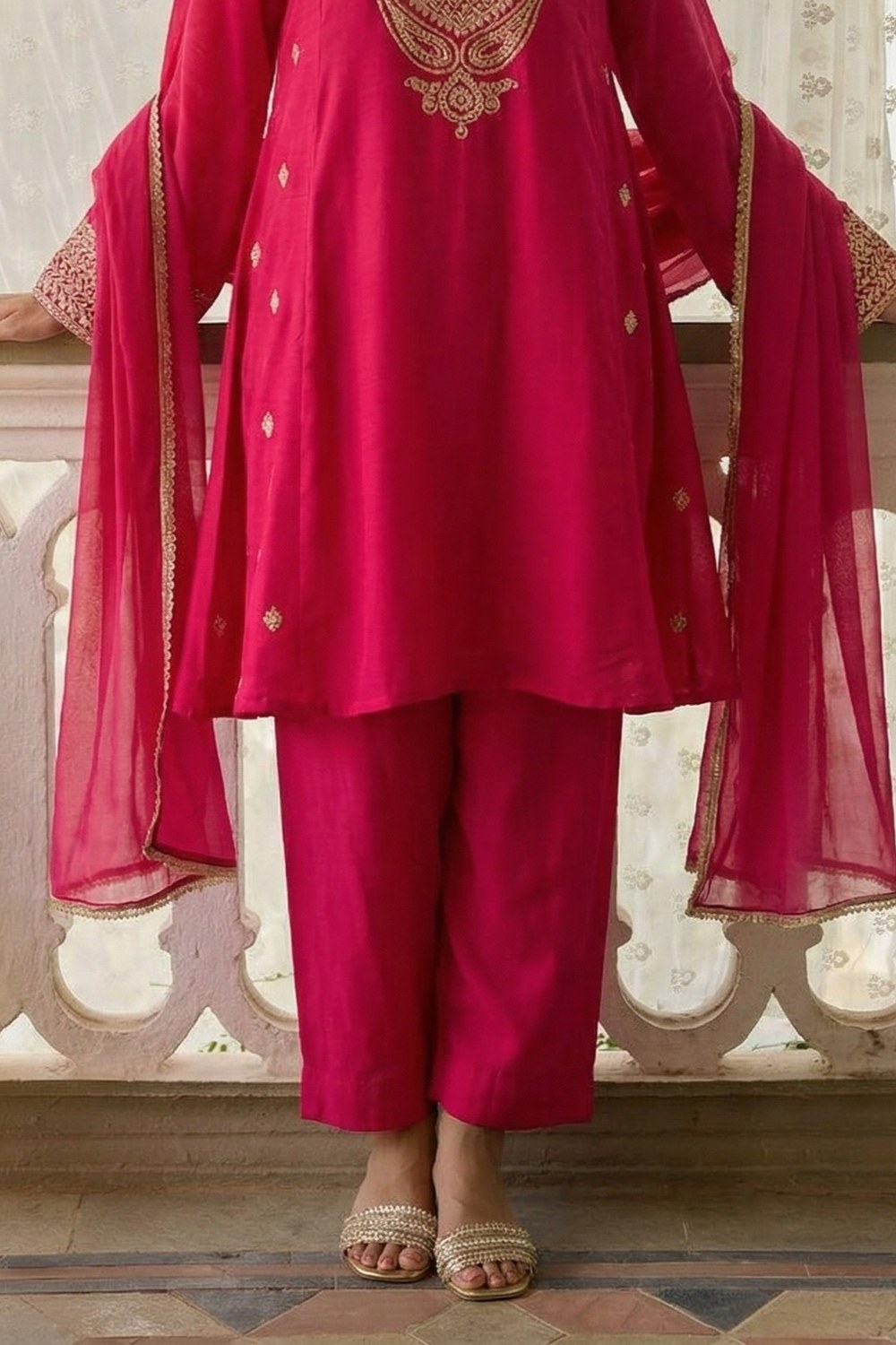 Pinkish Red Cotton Silk Embroidery Loose Fit A Line Kurta Set for Women - hem and footwear detail