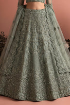 Sage Green Long Sleeves Lehenga Choli for Wedding Guest in Net - Thread & Sequins Work - hem and footwear detail
