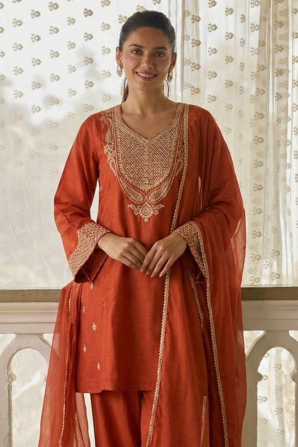 Rust Orange Cotton Silk Embroidery Work Loose Fit A Line Kurta Set for Women - close-up view