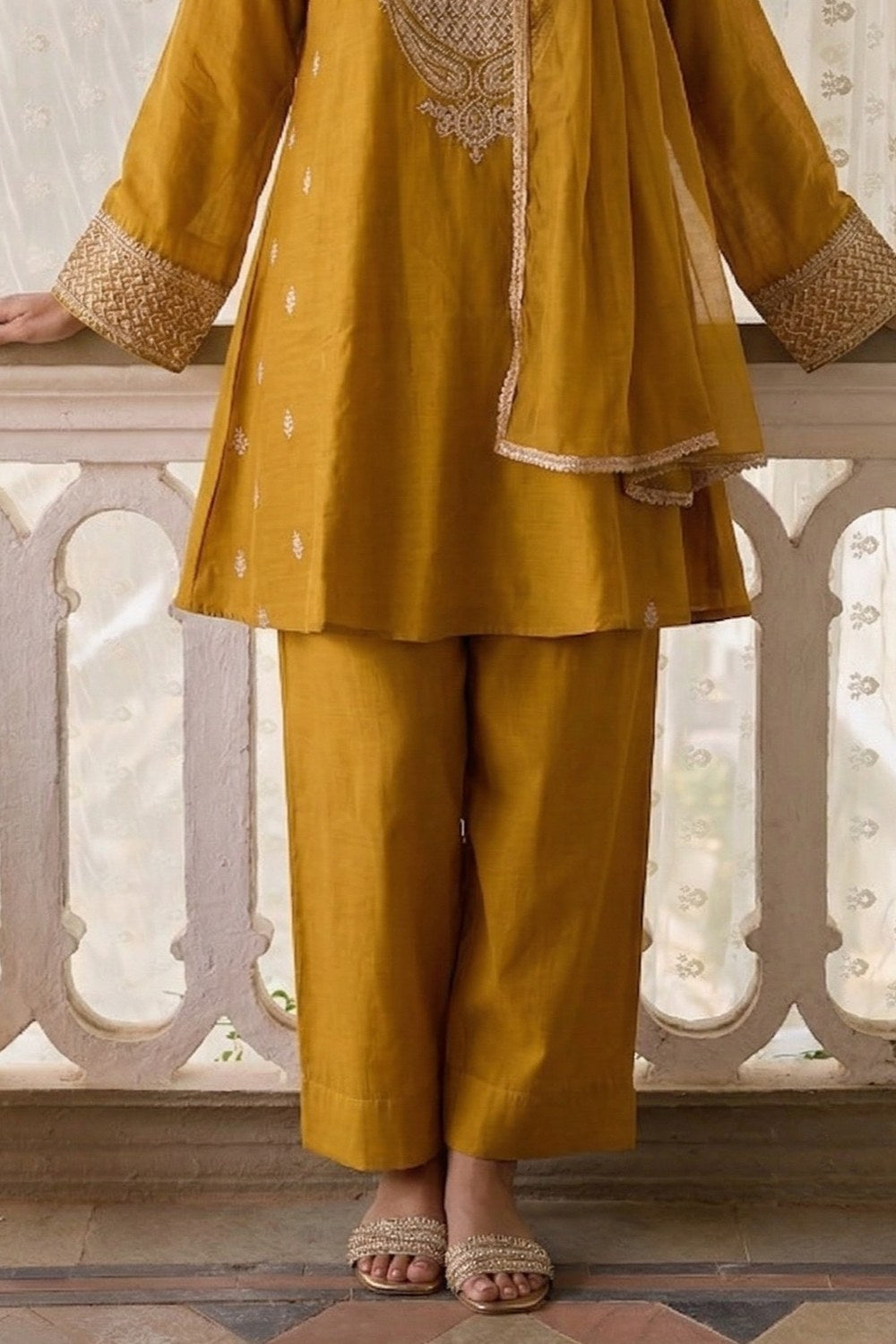 Mustard Yellow Cotton Silk Loose Fit A Line Kurta Set for Women with Embroidery - hem and footwear detail