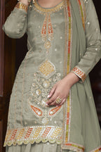 Pista Green Simmer Silk Kameez with Skirt Suit For Indian & Pakistani Wedding Festival - Thread & Sequins Embroidery Work - hem and footwear detail